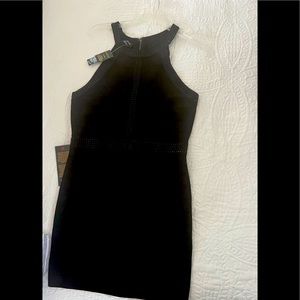 Bebe Black cocktail Dress. Sleeveless. 86% rayon, 14% spandex.  Size Large.